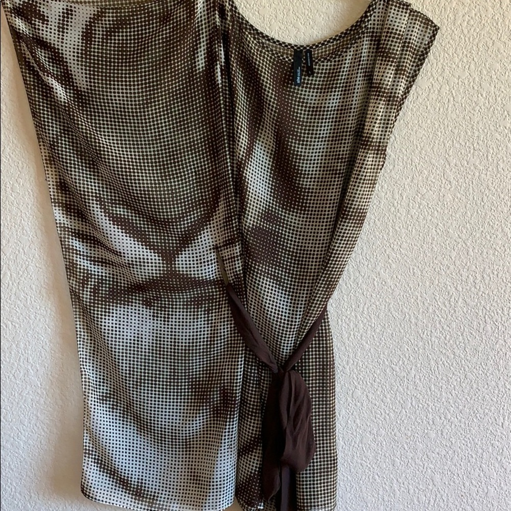 Sheer tunic with tiger print.